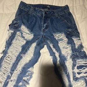 One of a kind Ripped jeans